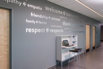Hallway with motivational words on wall.