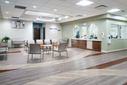 Modern, spacious waiting room with seating area.