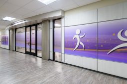 Modern hallway with purple decorative panels.