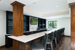 Modern home bar with wooden accents.